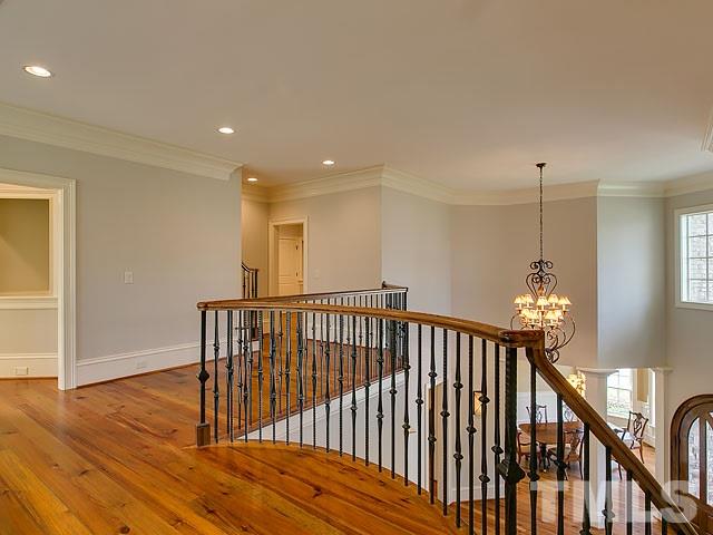 2921 Cone Manor Lane Raleigh, NC 27613 - Photo 16 of 25 a view of hallway with wooden floor