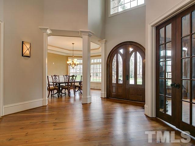 2921 Cone Manor Lane Raleigh, NC 27613 - Photo 3 of 25 a view of dining room with furniture and wooden floor