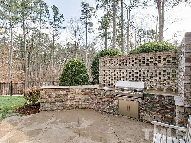 2921 Cone Manor Lane Raleigh, NC 27613 - Photo 23 of 25 a view of a yard and an outdoor seating