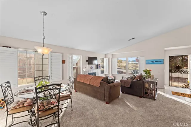 a living room with furniture and a couch