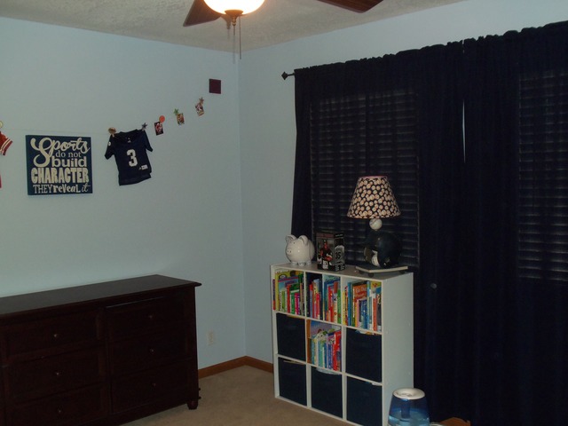 2031 Lisbon Road, Unit B Morris, IL 60450 - Photo 13 of 21 a view of a hallway with shelves