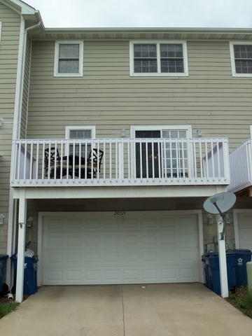 2031 Lisbon Road, Unit B Morris, IL 60450 - Photo 19 of 21 a front view of a house with windows