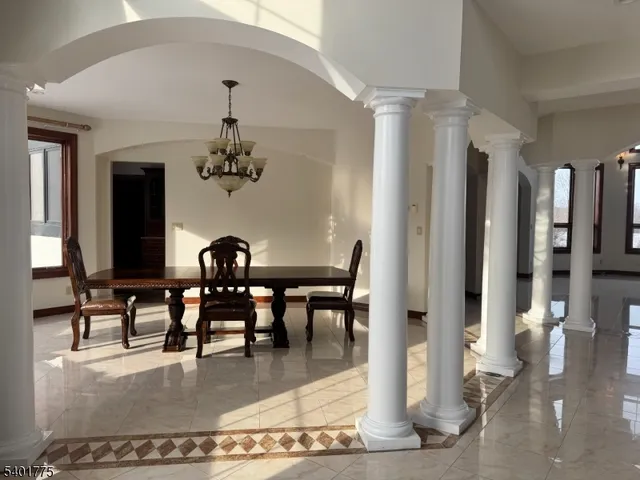 a view of a dining room with furniture
