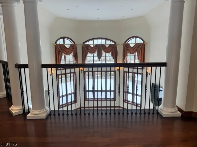 a view of windows with wooden floor