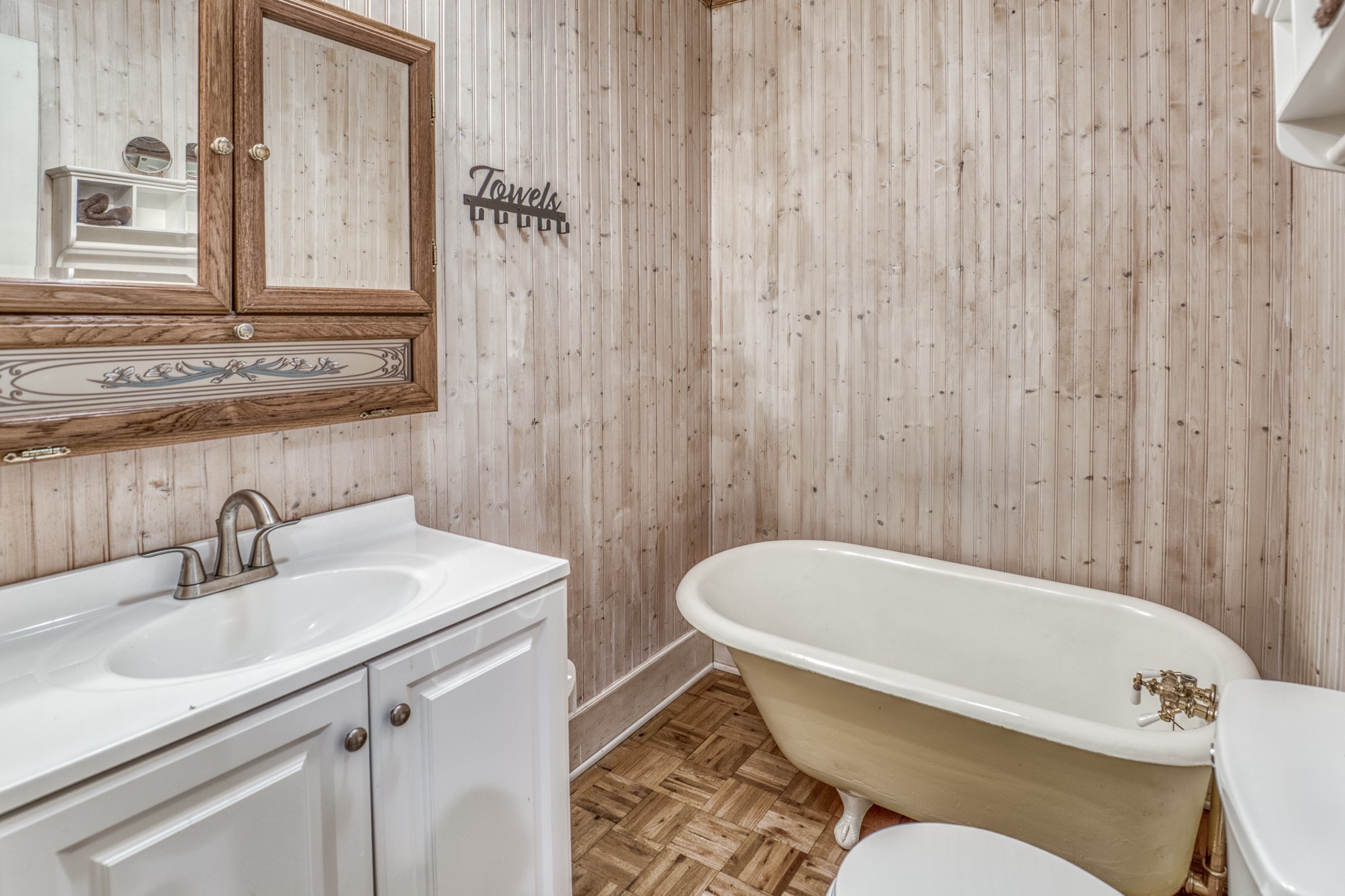 1017 Allen Road Cat Spring, TX 78933 - Photo 37 of 47 a bathroom with a sink and a bathtub