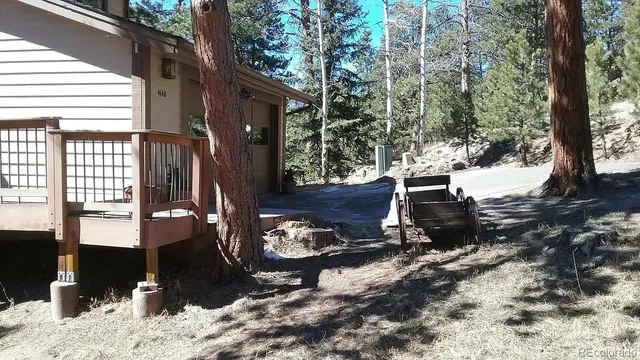 a view of house with outdoor space and sitting space