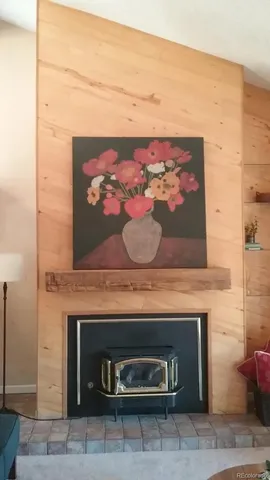 a fireplace with a wall