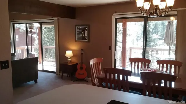 a living room with furniture and a windows