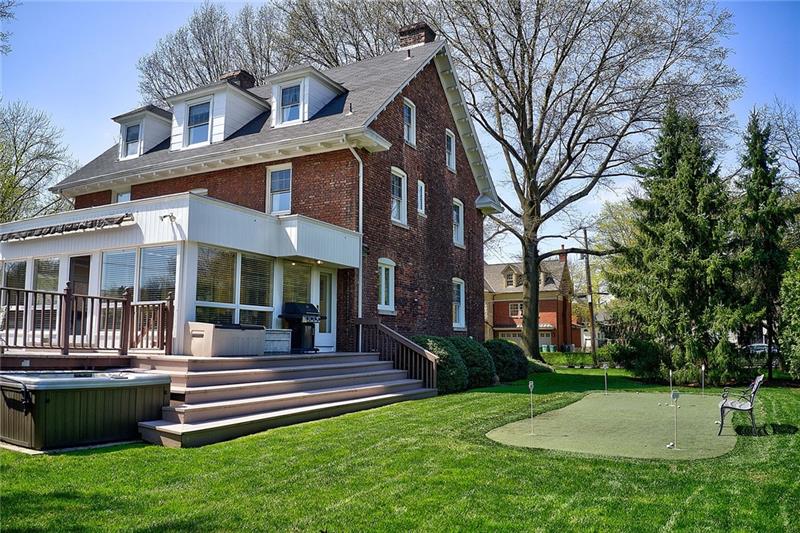 304 Quaker Road Sewickley, PA 15143 - Photo 22 of 25 Backyard oasis includes a pool and putting green.
