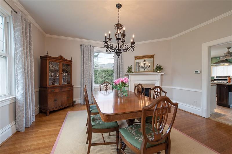 304 Quaker Road Sewickley, PA 15143 - Photo 4 of 25 Party-perfect formal dining room off entry also opens to kitchen for easy entertaining.