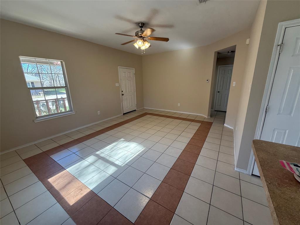 900 Reese Lane Azle, TX 76020 - Photo 5 of 15 a view of an empty room and window