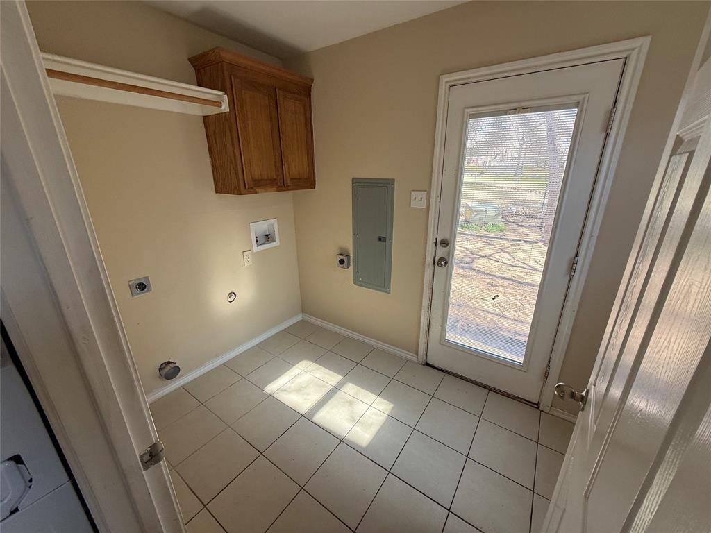 900 Reese Lane Azle, TX 76020 - Photo 10 of 15 a view of an empty room with windows