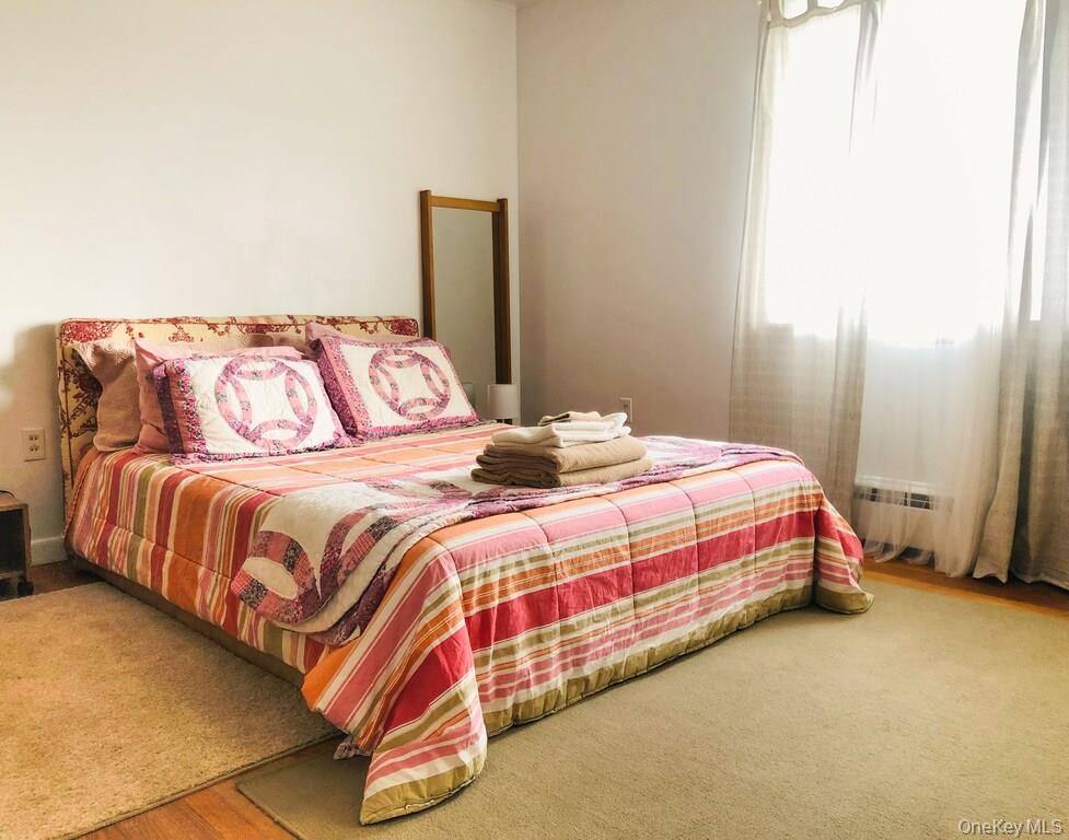 68-78 Ridge Road Clinton Corners, NY 12514 - Photo 26 of 50 a bedroom with a bed and a night stand