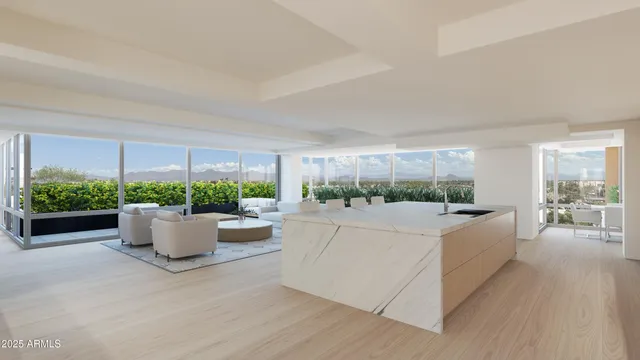 a living room with a couch and a large window