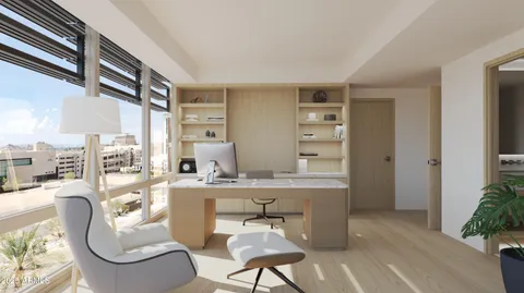 a workspace with furniture and a large window