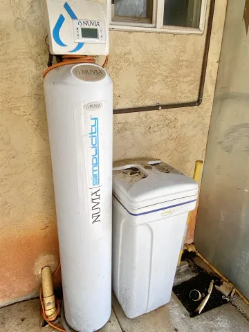 a bathroom with a tub and a shower
