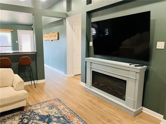 a living room with a fireplace