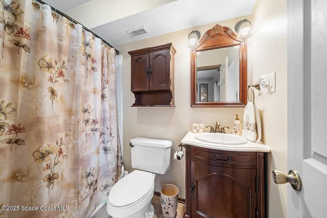 a kitchen with stainless steel appliances granite countertop a stove and a cabinets