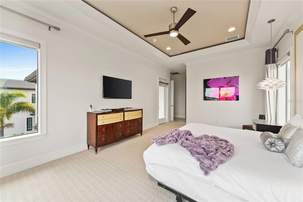 460 Muirfield Loop Reunion, FL 34747 - Photo 39 of 60 a living room with a couch and a flat screen tv