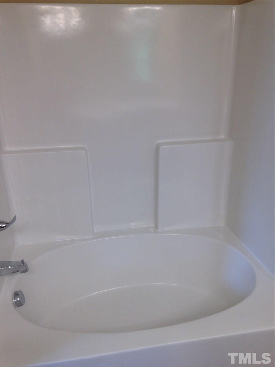 106 Orkney Road Stem, NC 27581 - Photo 14 of 21 a close up of a bathtub