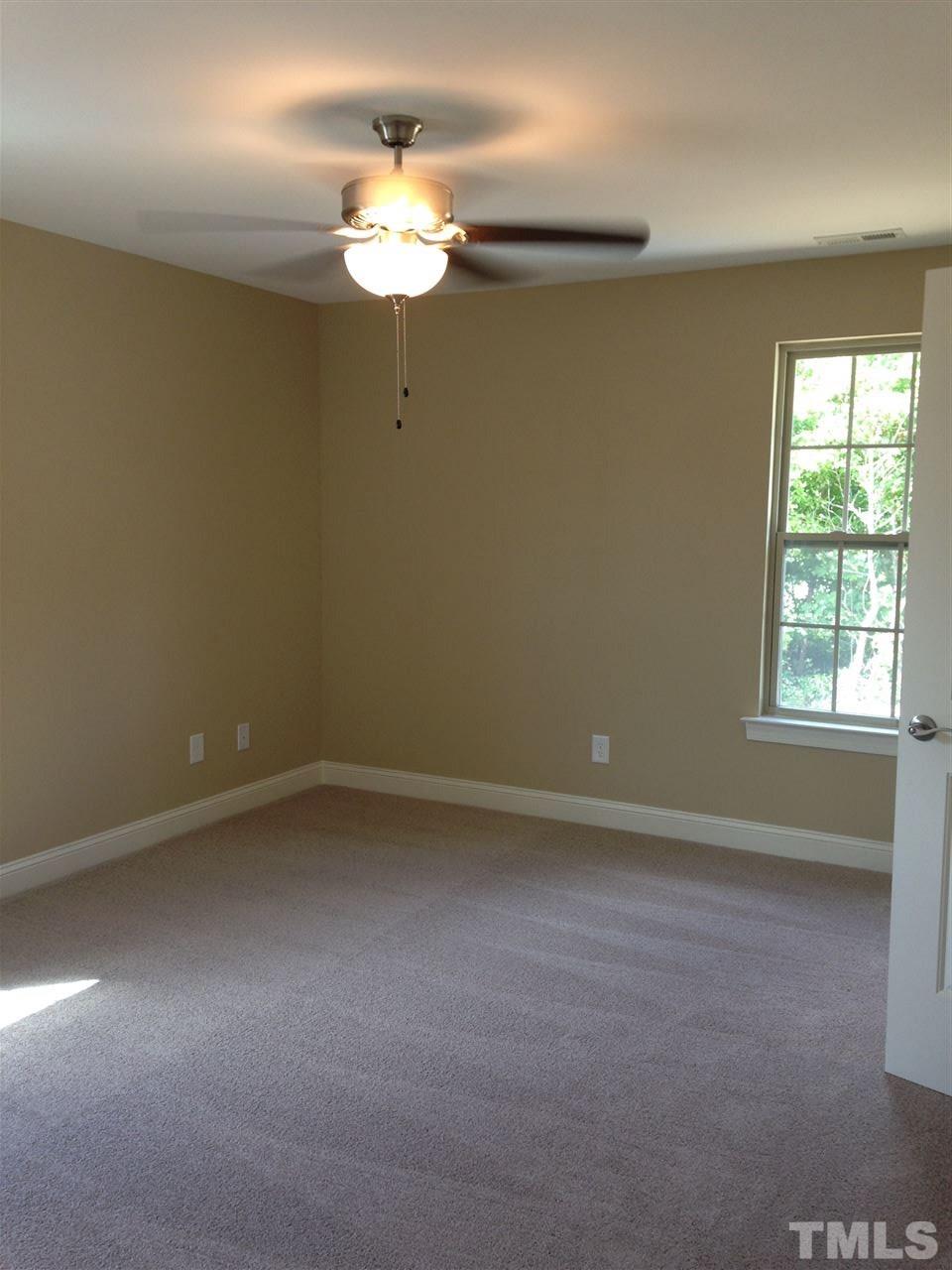 106 Orkney Road Stem, NC 27581 - Photo 8 of 21 an empty room with a window