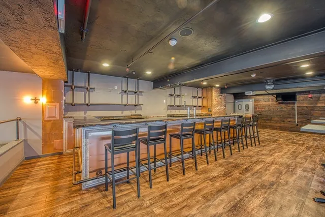 a kitchen with a table and chairs in it