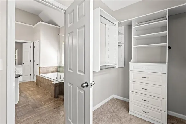 a view of an empty walk in closet