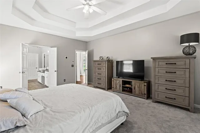 a bedroom with a bed and furniture