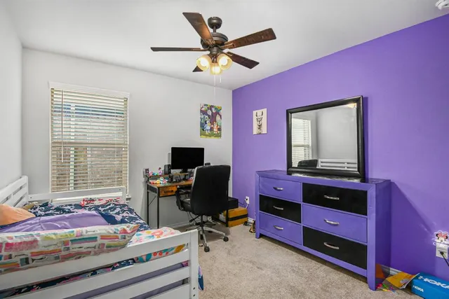 a workspace with furniture and window