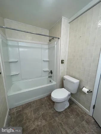 a bathroom with a sink a mirror and a shower