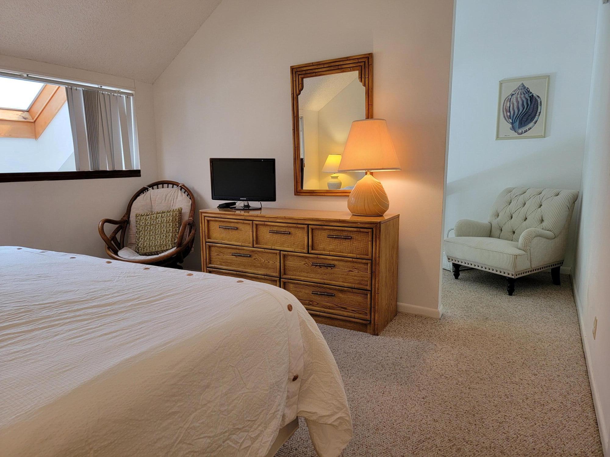 1605 Highway 1, Unit M2210 Jupiter, FL 33477 - Photo 21 of 28 a bedroom with a bed and window