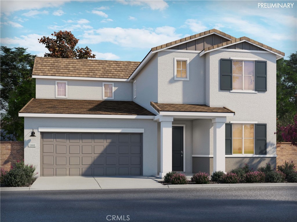 a front view of a house with a garage