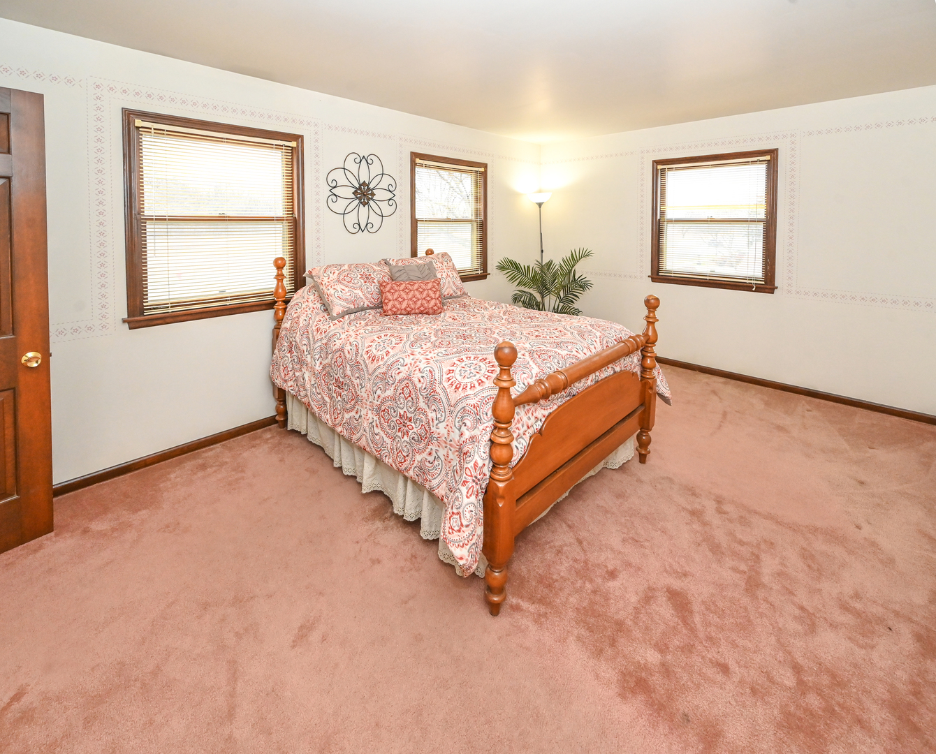 249 South Arlington Heights Road Elk Grove Village, IL 60007 - Photo 13 of 21 a bed sitting in a bedroom next to a window