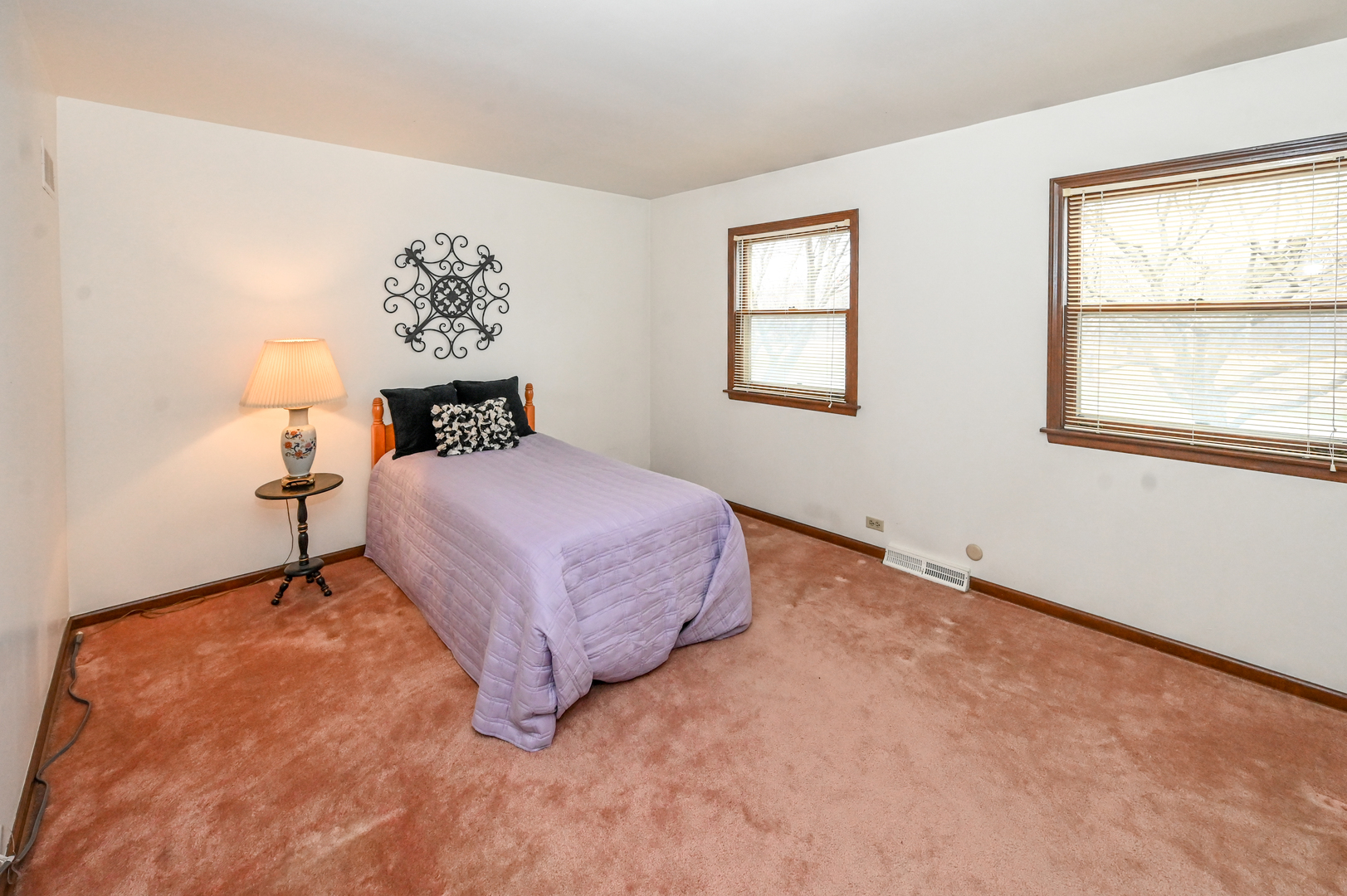 249 South Arlington Heights Road Elk Grove Village, IL 60007 - Photo 16 of 21 a bedroom with a bed and a window