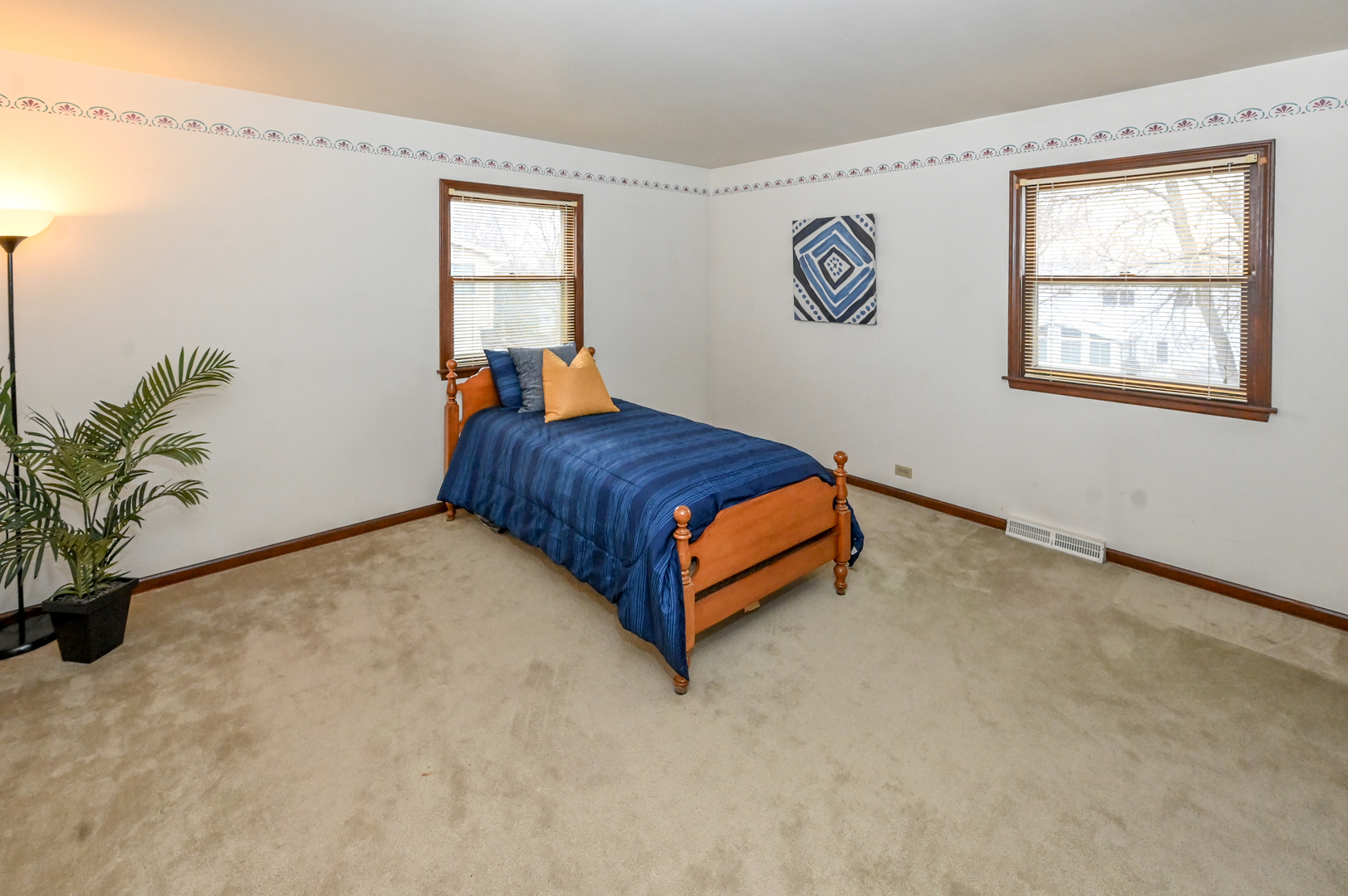 249 South Arlington Heights Road Elk Grove Village, IL 60007 - Photo 17 of 21 a room with a bed and a window