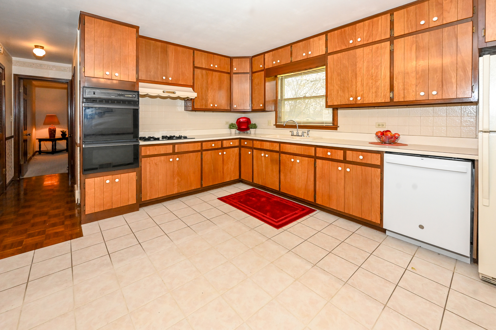 249 South Arlington Heights Road Elk Grove Village, IL 60007 - Photo 9 of 21 a kitchen with stainless steel appliances granite countertop a stove a sink and a microwave