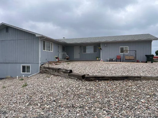 a living room with a couch and a fireplace