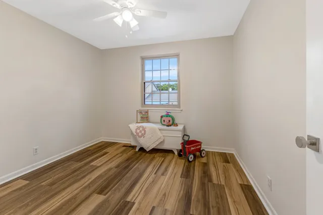 a room that has a bed and a window