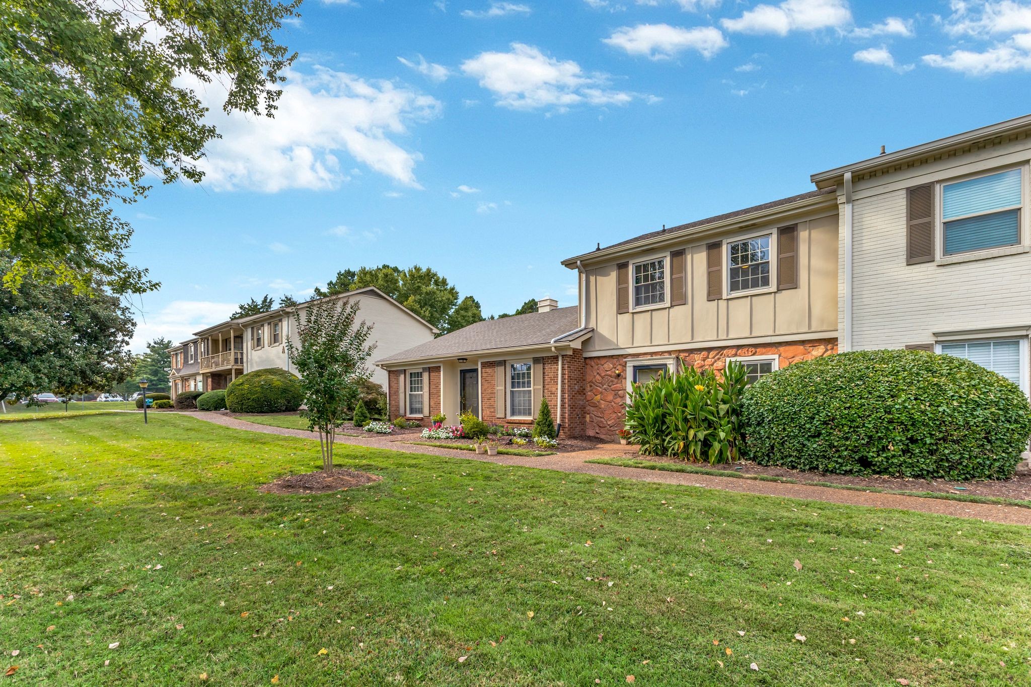 1011 Murfreesboro Road, Unit B2 Franklin, TN 37064 - Photo 3 of 39 a front view of house with yard and green space