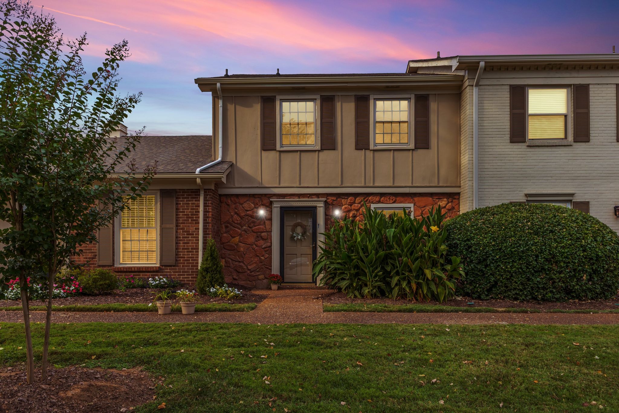 1011 Murfreesboro Road, Unit B2 Franklin, TN 37064 - Photo 33 of 39 a front view of a house with garden
