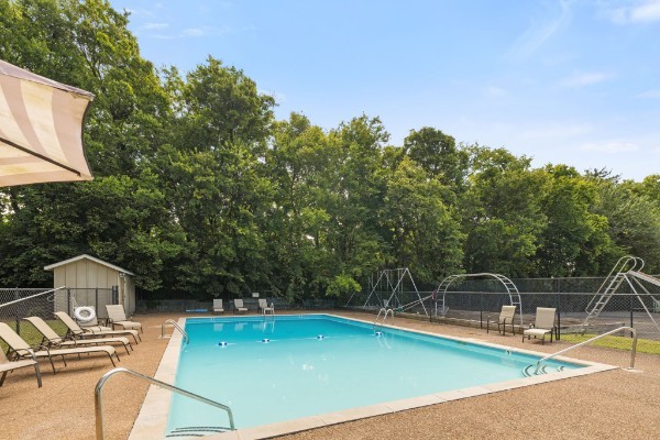 1011 Murfreesboro Road, Unit B2 Franklin, TN 37064 - Photo 37 of 39 a view of a swimming pool with a patio