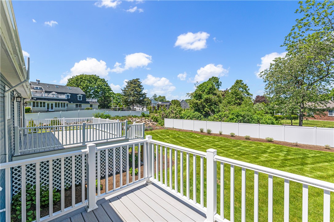 4 Shore Road Westerly, RI 02891 - Photo 5 of 36 The larger deck has space for a grill and dining table.