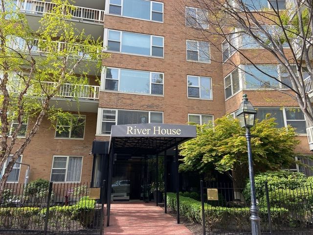 a view of a city with tall buildings