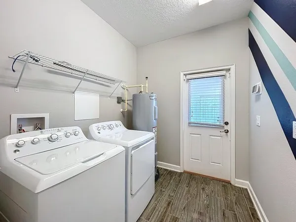 a view of a backyard of the house