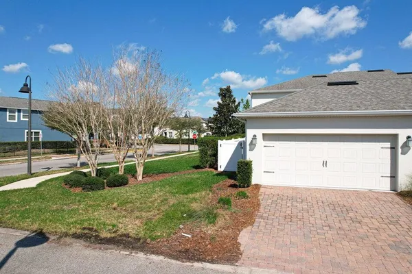a kitchen with stainless steel appliances granite countertop a sink a stove and microwave