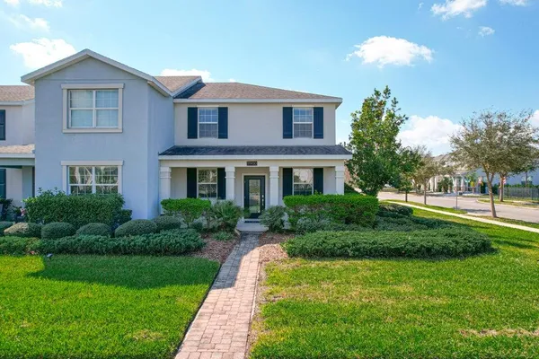 an aerial view of residential building with parking space