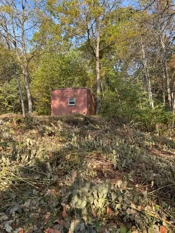 view of an outdoor space and a yard