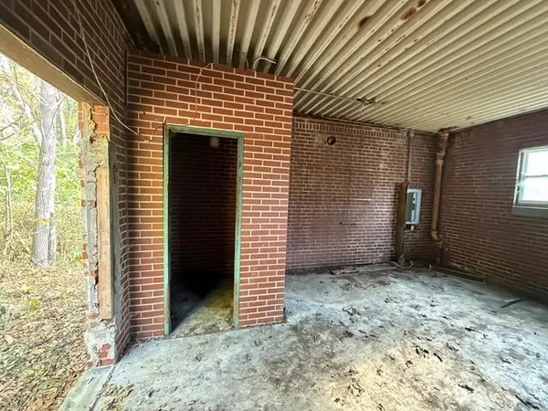 a view of a porch with a backyard