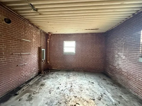 a view of a room that has a window
