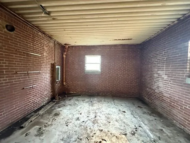 a view of a room that has a window